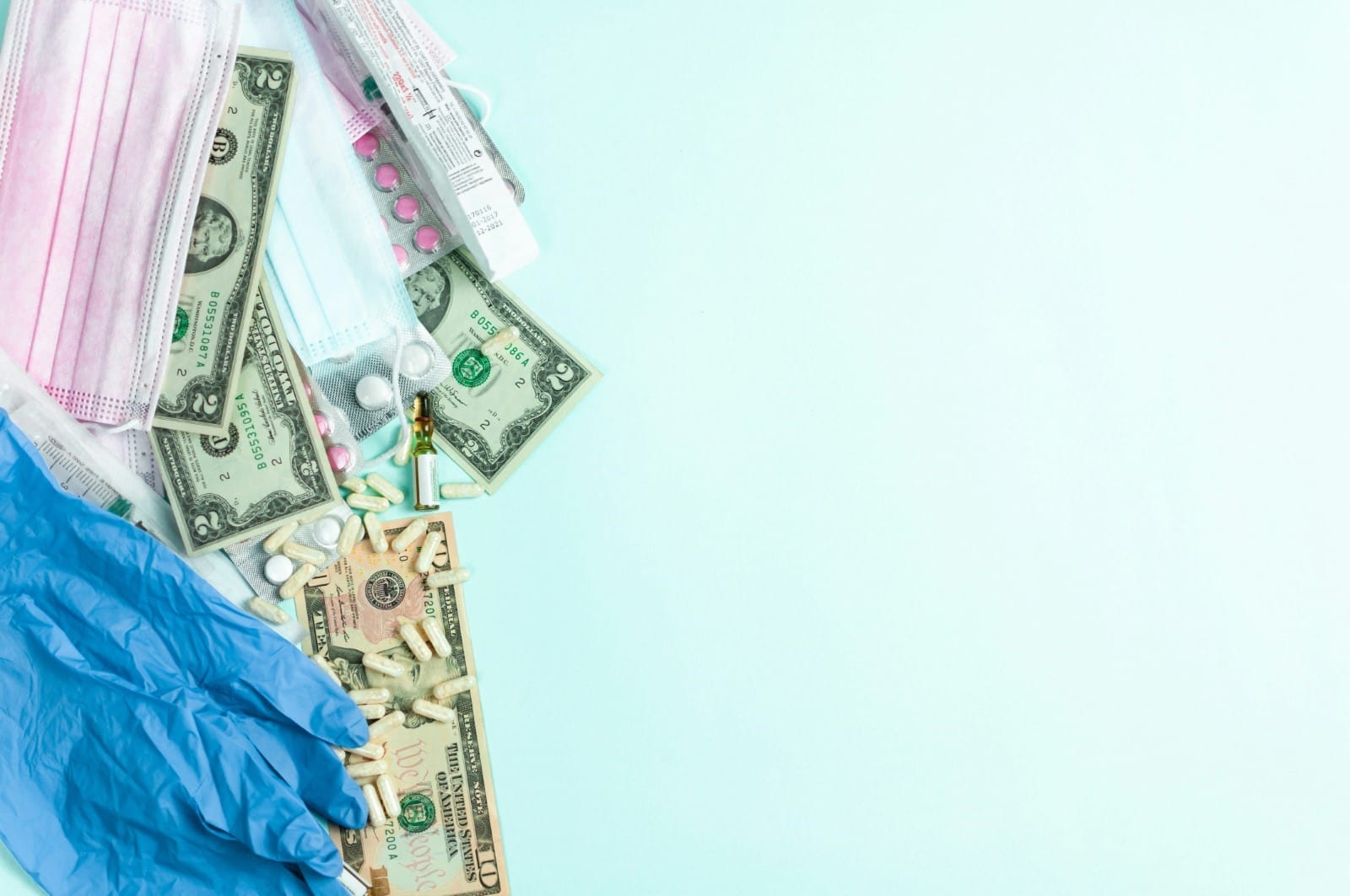 A pile of money and medical tools  