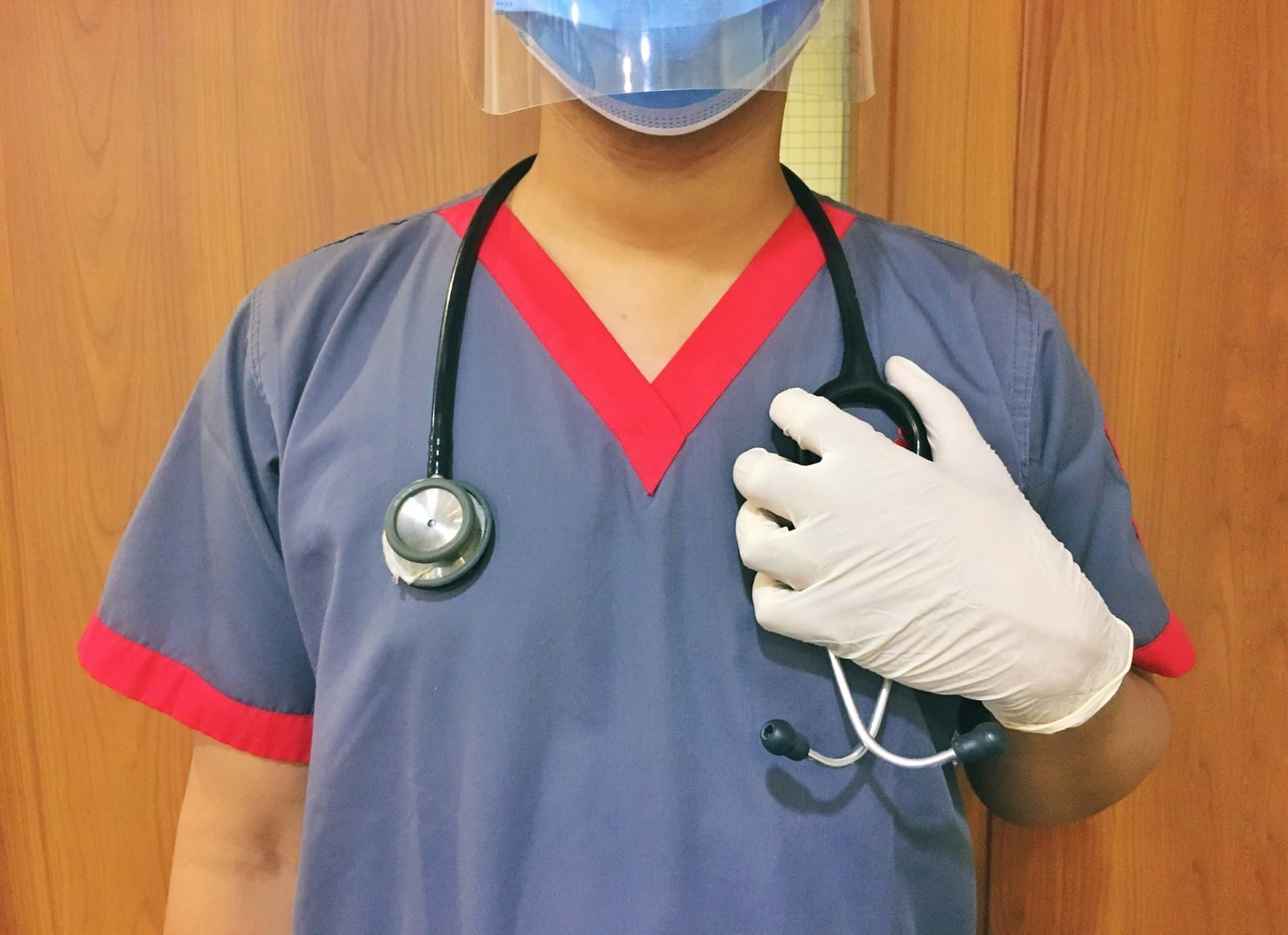 Clinic staff wearing a scrub